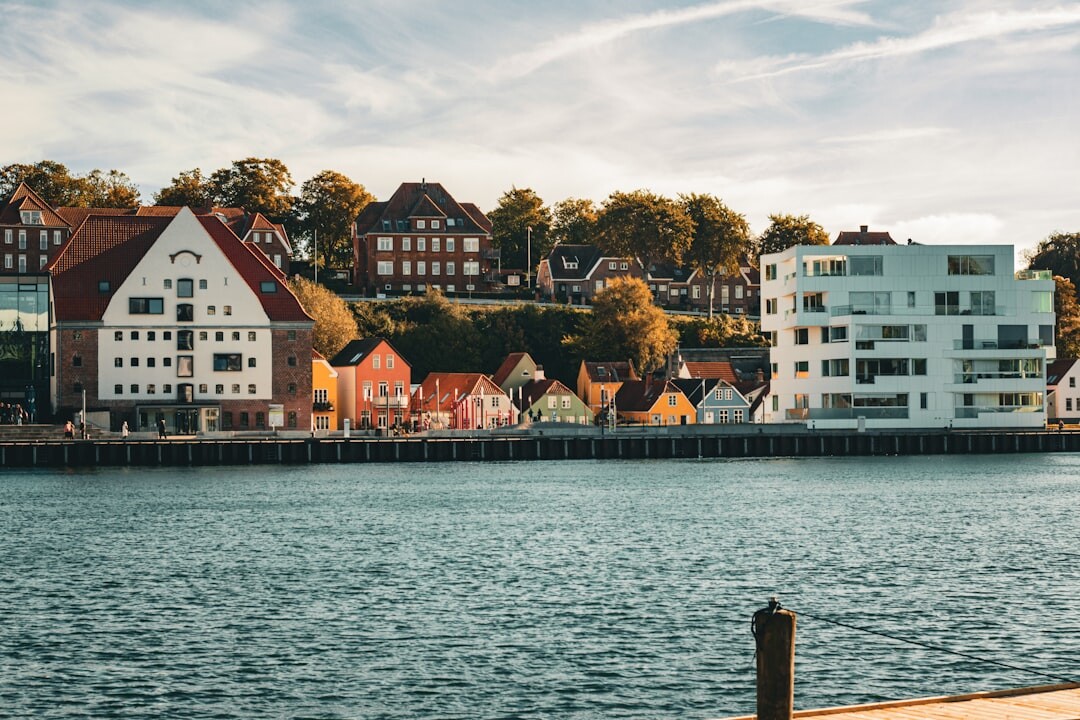 Coastal town in Denmark with colorful houses along the harbor