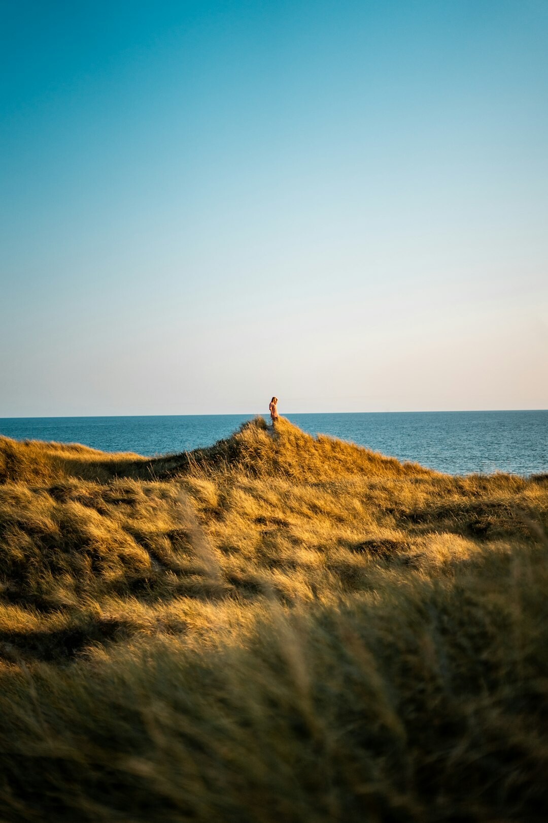 Documentary photographer capturing daily life in a small Danish fishing village