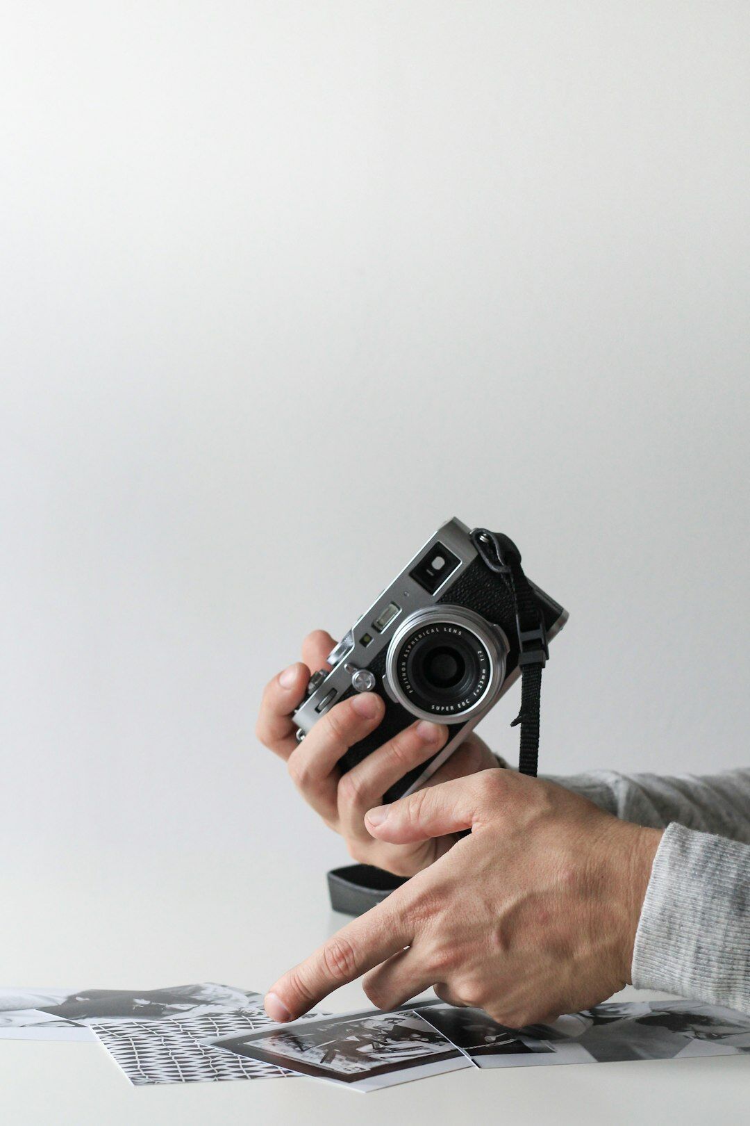 photographer reviewing photos with subject